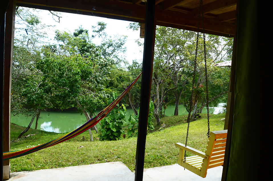 hammock on the porch and deck chairs.